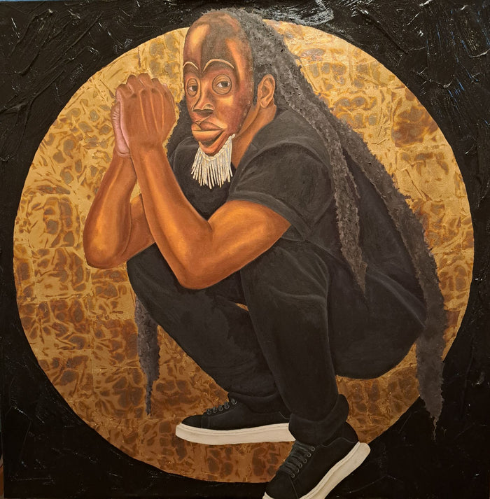 portrait of a person of color dressed in all black modern clothing wearing a traditional African mask; they are surrounded by a gold circle that they almost fit completely in; outside of the circle is all black textured paint