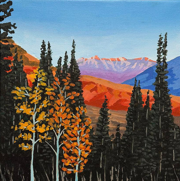 Painting of a mountain landscape with trees on a beige wall