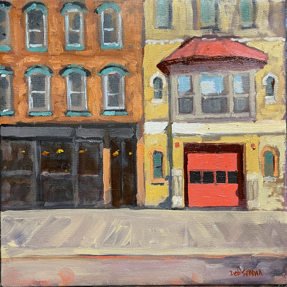Painting of a city street with a yellow building and red door.