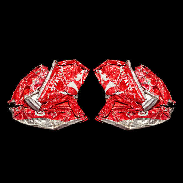 Photographic print of two crushed Coke cans