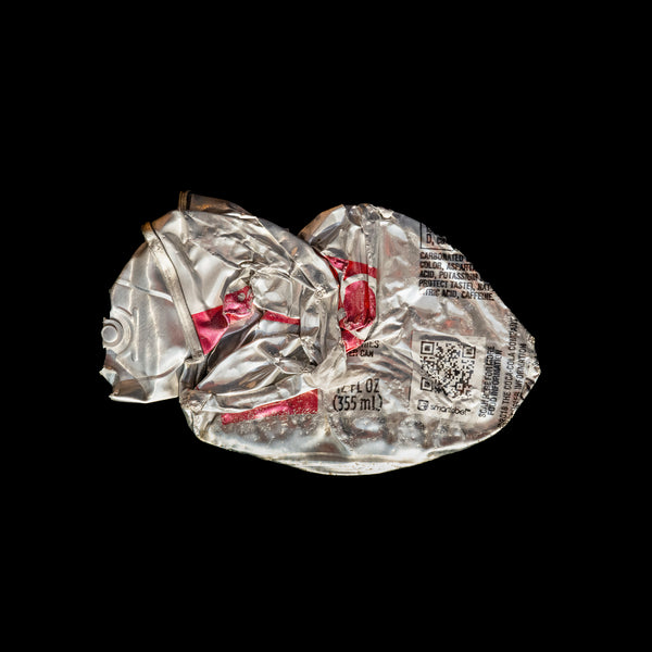 Photographic print of a crushed Diet Coke can