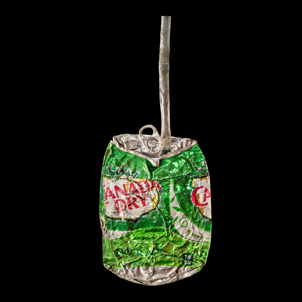Photographic print of a crushed Canada Dry can