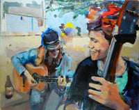 two women playing guitar outside